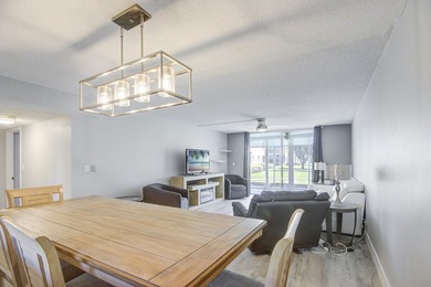 YOU WILL WANT THIS 1ST FLOOR... END UNIT ...WITH IMPACT GLASS - photo 7