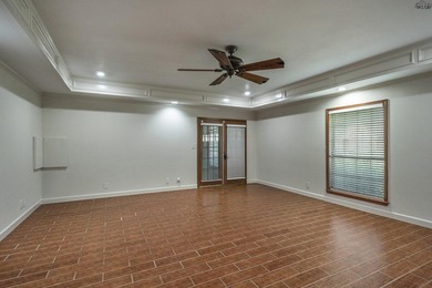 Tucked on a corner lot in Midwestern Park, this 4-bed, 3-bath - photo 17