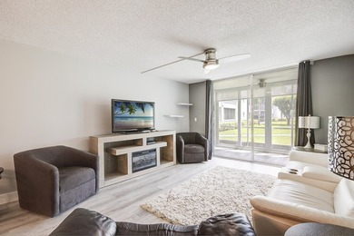 YOU WILL WANT THIS 1ST FLOOR... END UNIT ...WITH IMPACT GLASS - photo 8