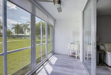 YOU WILL WANT THIS 1ST FLOOR... END UNIT ...WITH IMPACT GLASS - photo 10