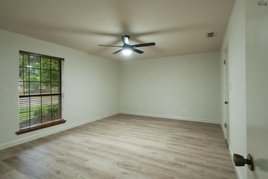 Tucked on a corner lot in Midwestern Park, this 4-bed, 3-bath - photo 28