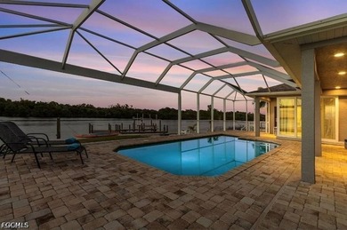 This beautiful 3 Bed 3 & 1/2 Bath riverfront pool home is truly - photo 31