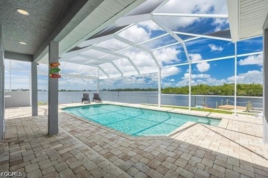 This beautiful 3 Bed 3 & 1/2 Bath riverfront pool home is truly - photo 35