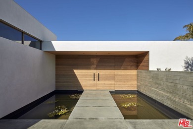 A new contemporary, this Point Dume residence designed by - photo 2