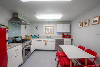 This property features a main single-family home alongside a - photo 6