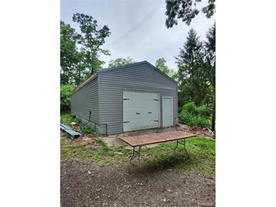 MOTIVATED SELLER, INVESTOR SPECIAL! Situated on nearly one-half - photo 3