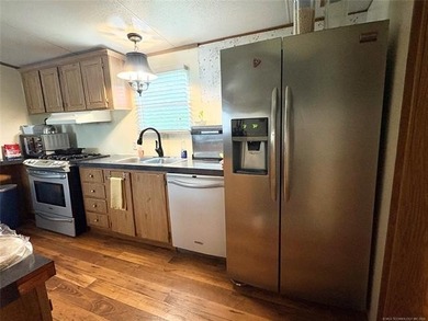 This clean and tidy 2 bed, 2 bath home is located in the highly - photo 11
