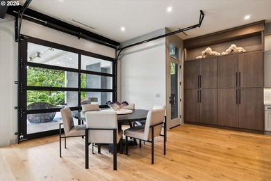 Tucked thoughtfully back from the street, this striking modern - photo 11