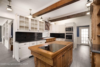 Refined living under the big elms on the brick streets. This