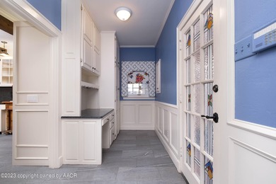 Refined living under the big elms on the brick streets. This