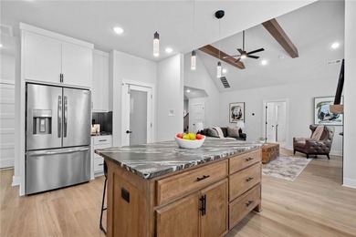Soaring vaulted ceilings with wood beams, gas log fireplace & - photo 14