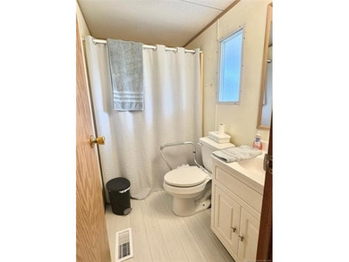This clean and tidy 2 bed, 2 bath home is located in the highly - photo 17