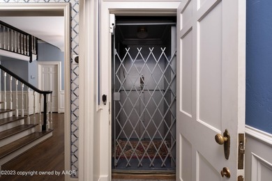 Refined living under the big elms on the brick streets. This