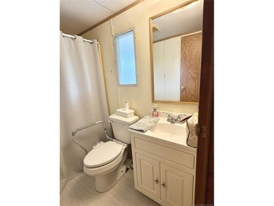 This clean and tidy 2 bed, 2 bath home is located in the highly - photo 18