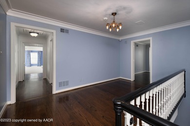 Refined living under the big elms on the brick streets. This