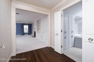 Refined living under the big elms on the brick streets. This