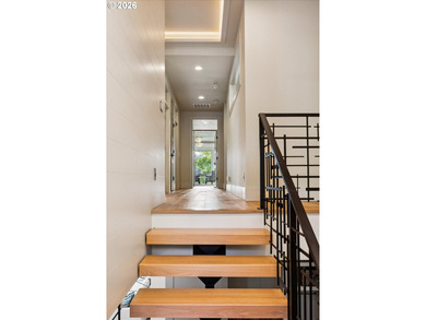 Tucked thoughtfully back from the street, this striking modern - photo 21