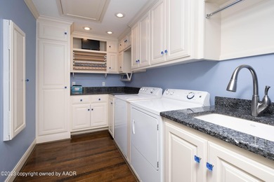 Refined living under the big elms on the brick streets. This