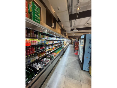 This strategically located grocery store presents an outstanding - photo 9