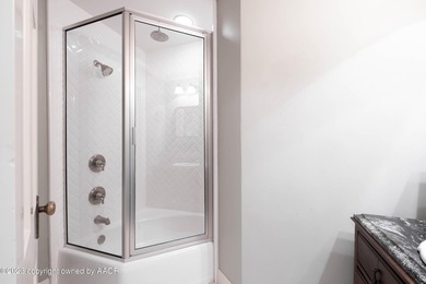 Refined living under the big elms on the brick streets. This