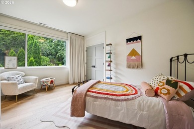 Tucked thoughtfully back from the street, this striking modern - photo 34