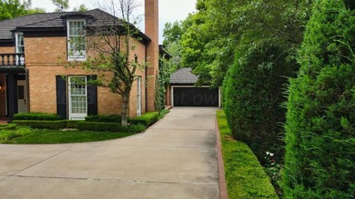 Refined living under the big elms on the brick streets. This