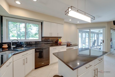 Welcome to this stunning golf course property offering an open - photo 13