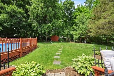 Don't miss this meticulously maintained 4-bedroom ranch in the - photo 26
