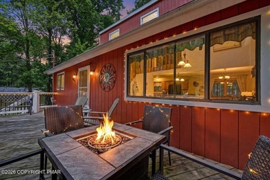 Welcome to this charming mountain chalet nestled in the highly - photo 3