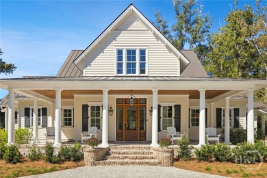 Where Lowcountry beauty meets timeless design, this custom-built - photo 4