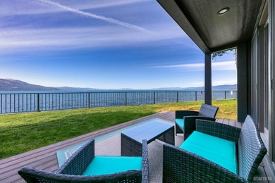 Discover unparalleled lakefront living in the exclusive gated - photo 3
