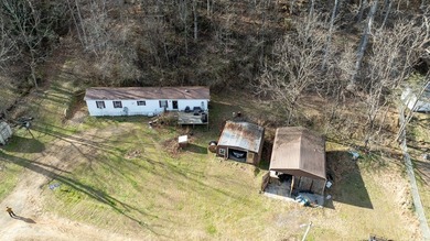 +9.7 unrestricted acres bordering Cherokee land and a - photo 2