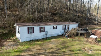 +9.7 unrestricted acres bordering Cherokee land and a - photo 3