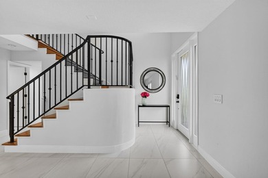 Located within the prestigious Eastpointe Country Club with - photo 3