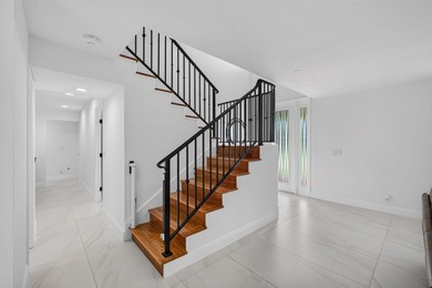 Located within the prestigious Eastpointe Country Club with - photo 4