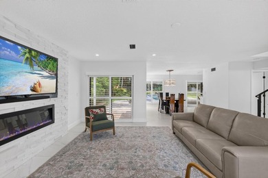 Located within the prestigious Eastpointe Country Club with - photo 6