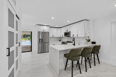 Located within the prestigious Eastpointe Country Club with - photo 9