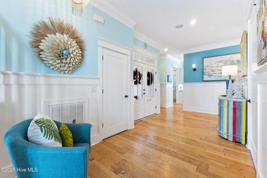 A showcase of refined coastal craftsmanship, this custom-built