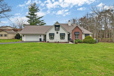 Dreaming of life on the lake? This home has it all! Step into an - photo 1