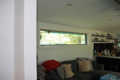 This home is priced to sell. Fully furnished. Open concept - photo 12