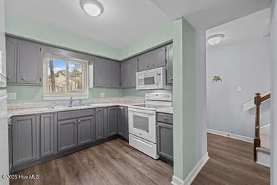 Are you ready to move into lovely townhome on the golf course? - photo 13