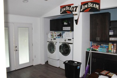 This home is priced to sell. Fully furnished. Open concept - photo 13