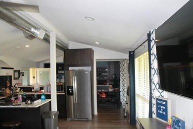 This home is priced to sell. Fully furnished. Open concept - photo 14