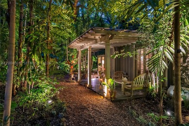 Tucked along one of Coconut Grove's most coveted streets, this - photo 15