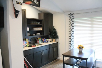 This home is priced to sell. Fully furnished. Open concept - photo 18