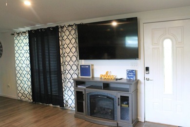 This home is priced to sell. Fully furnished. Open concept - photo 20