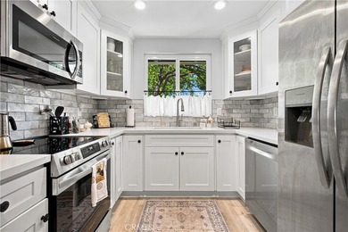Welcome to this beautifully updated 2-bedroom, 1-bathroom condo - photo 1