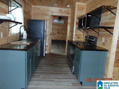 Discover cozy modern living in this brand new tiny house that - photo 9