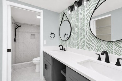 FIRST FLOOR UNIT - PRIME LAKEFRONT VIEWS. Wake up to serene - photo 1