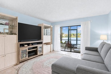 FIRST FLOOR UNIT - PRIME LAKEFRONT VIEWS. Wake up to serene - photo 2